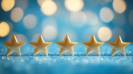Five gold stars on glittering blue background with bokeh lights; rating, ranking, excellence concept.