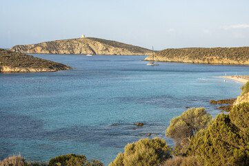 Aerial view of Tuerredda bay with the beach of fine sand and transparent blue and turquoise water