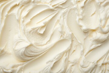 Smooth, creamy frosting swirls together, creating a delectable texture perfect for cakes and desserts