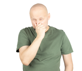 Disgusted man pinching his nose due to bad smell