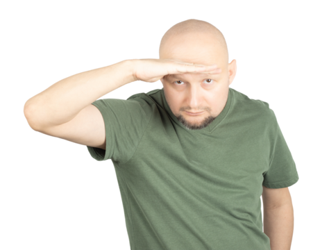 Curious man looking into the distance with a hand salute