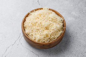 Homemade uncooked kataifi or kadaifi dough.