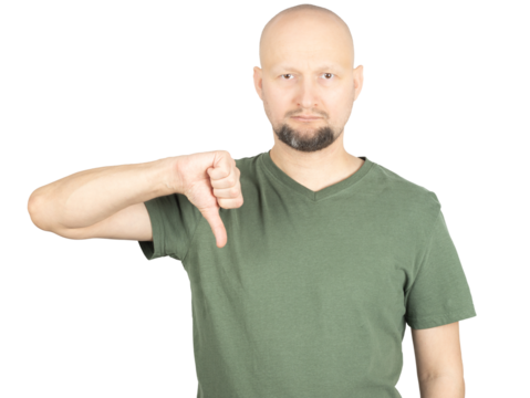 Serious man making a thumbs-down gesture expressing disapproval