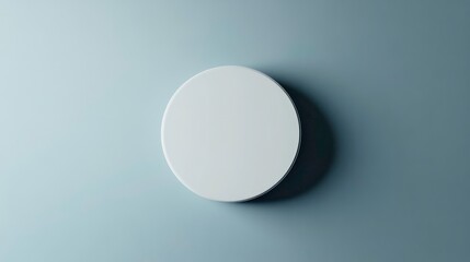 A single, blank, white circle against a light blue background.