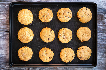 Home baked biscuits on a baking tray fresh out of the oven