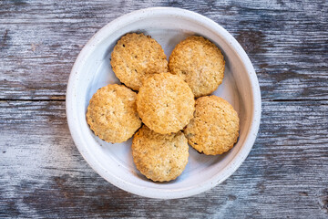 A plate of home baked biscuits seen from above