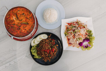 Set of Thai food, Tom yam, Stir fried Minced Pork and Yam Woon Sen.