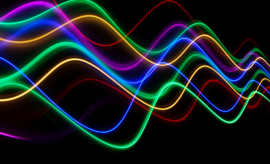 A long exposure photograph. Light painting photography, vibrant fairy lights against a black background