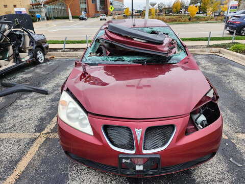 Chicago, USA - November 11, 2024: Pontiac G6 car crash and damage. Damage of car in accident. Car crash insurance. Broken Pontiac G6, front view. 2008 Pontiac G6 crashed in car accident