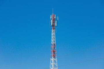 Obraz premium Telecommunications towers that transmit signals in community areas and connect to national networks. against the sky background