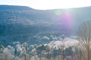 Winter Sun Over a Mountain Valley