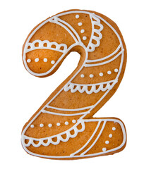 Decorated Gingerbread Number Two Cookie with white sugar glaze isolated on white background. Christmas cookies.