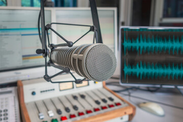 Professional microphone and sound mixer in radio station studio