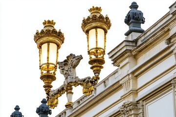 Two street lights sit atop a building, providing illumination at night