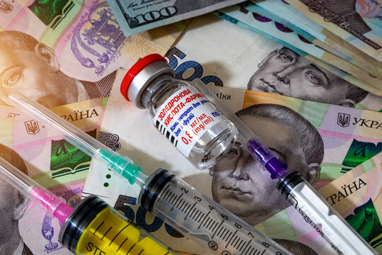 Kyiv. Ukraine. January 19, 2025. A bottle of zoledronic acid, a medicine for the treatment of oncology, on the background of money.