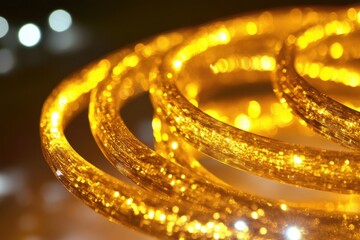 Close-up shot of a bunch of shiny gold bracelets