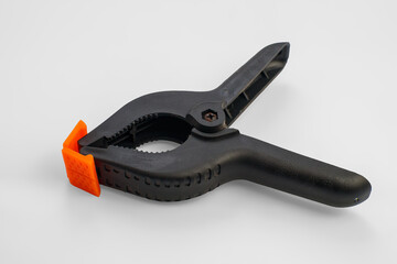 Obraz premium Plastic Clamp with Orange Protector