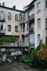 Fototapeta premium Soviet-era apartment buildings in Telavi, capital of Kakheti, Georgia, on a cloudy day