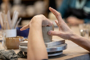 making pottery out of clay