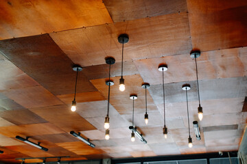  luxury expensive chandelier hanging under ceiling.