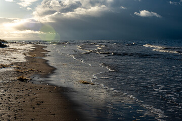 beautiful waves crashing against the seashore, windy day on the rocky shore of Vidzeme, Baltic Sea
