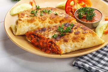 Mexican cuisine - chicken burrito with beans