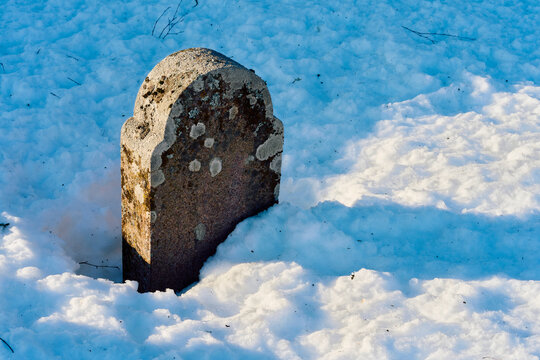 tombstone in the snow