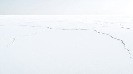 Expansive icy landscape with intricate cracks showcasing nature'