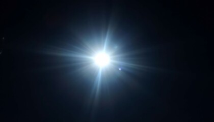 Radiant Starburst: A Celestial Light Display in Dark Serenity