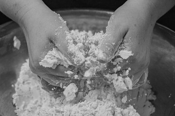 Hands Mixing Dough