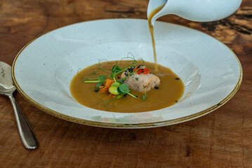 Gourmet Soup with Salmon and Vegetables
