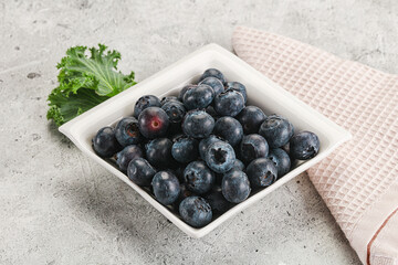 Sweet ripe blueberry on the bowl