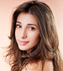 Fototapeta premium Gorgeous Hair. Beauty Fashion Model Woman with Long and Healthy Brown Hair. Brunette Girl with long hair smiling.
