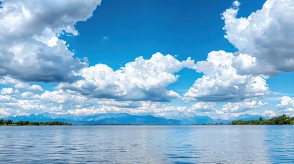 A large body of water with mountains in the background