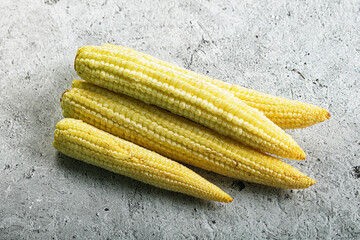 Raw sweet baby corn heap