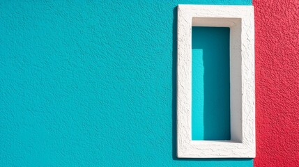 A blue and red wall with a white frame on it