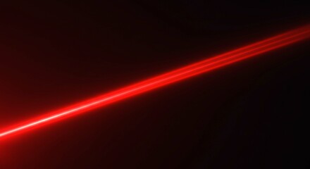 Fototapeta premium Abstract Red Laser Beam Light Streak on Black Background Dynamic Energy Bright Glowing Line