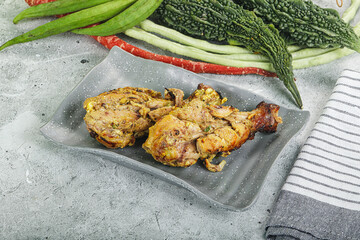 Chicken leg tikka with spices