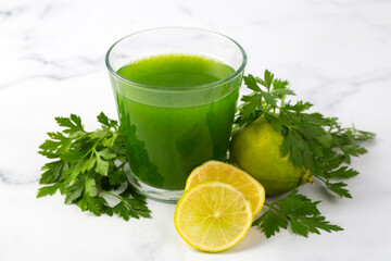 Green healthy detox, lemon and parsley juice. Green vegetable smoothie