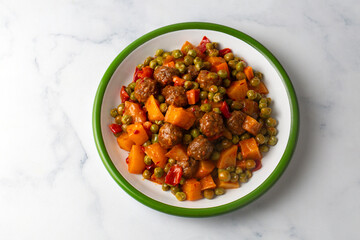 A type of meatball made from traditional Turkish cuisine with potatoes, peas, carrots and minced meat. Turkish name; Cıftlık kofte