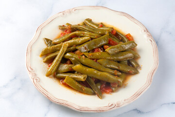 Traditional delicious Turkish food; Green beans with olive oil; Turkish name; Zeytinyagli taze...