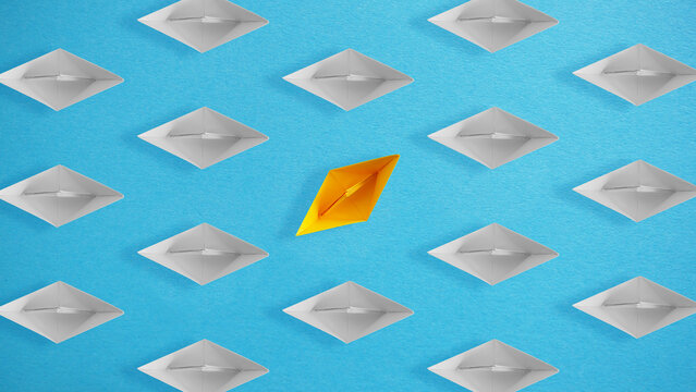 Paper ship dare to different direction from others. Game changer concept