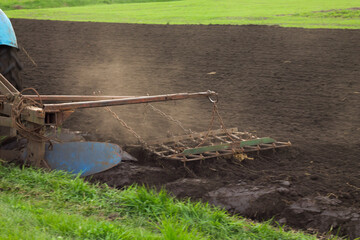 Fototapeta premium tractor working in the field