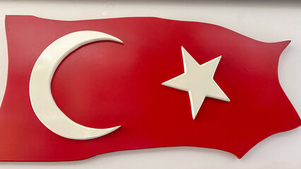 Turkish Flag Design With Crescent And Star On A Bold Red Background, Displayed Indoors, Symbolizing...