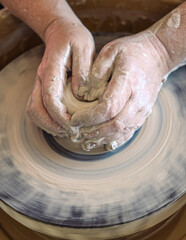 Spinning Clay on a Wheel 
