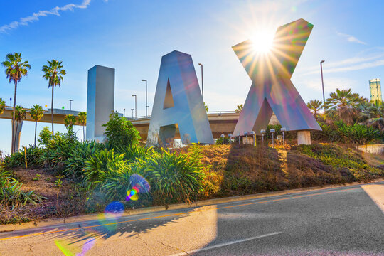Los Angeles, California - January 6, 2025: LAX Sign at Los Angeles International Airport with Sunlight and Flares