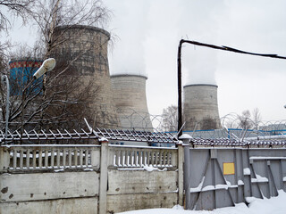 close-up of the cooling tower of thermal power plant. Enterprise for generating heat for the...