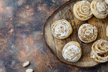 Delicious homemade meringue roll round cookies with nuts.