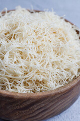 Homemade uncooked kataifi or kadaifi dough.