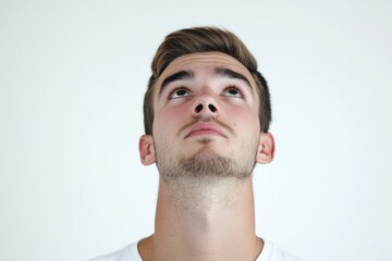 Obraz premium A person gazing up with wide-open eyes, perfect for conveying surprise or amazement